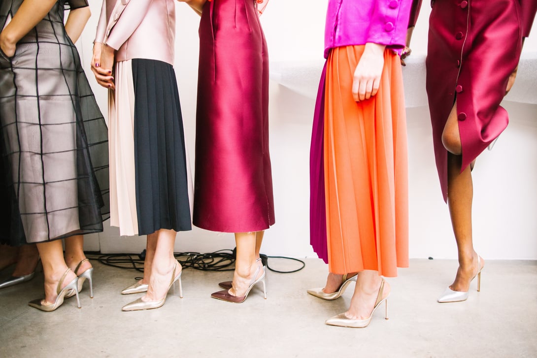 Fashionable Women Standing on a Line